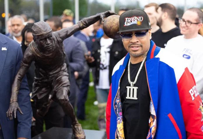Philadelphia 76ers great Allen Iverson poses after the unveiling of the statue honoring him. (Bill Streicher-USA TODAY Sports)